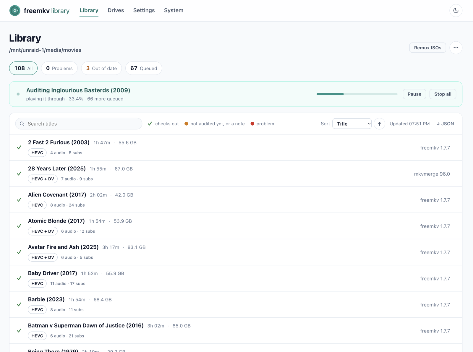The freemkv-library Library tab: every movie with its codec, track counts and the tool that made it, a live audit in progress, and filters for problems, out-of-date and queued files